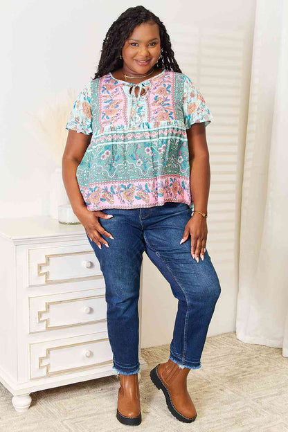 Double Take Floral Tie Neck Short Sleeve Blouse - Selden & Kingsley